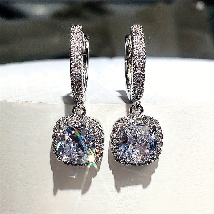 Evelina | Zirconia Halo Huggie Earrings