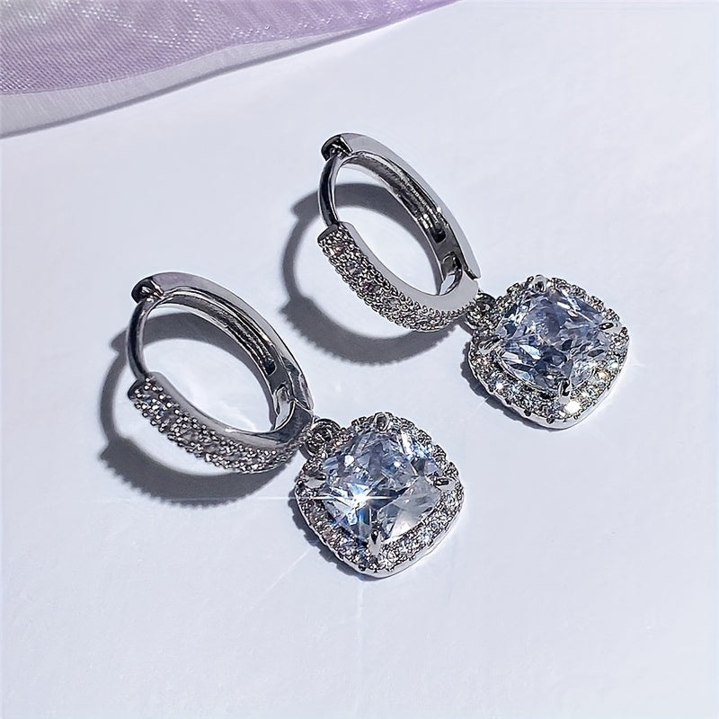 Evelina | Zirconia Halo Huggie Earrings