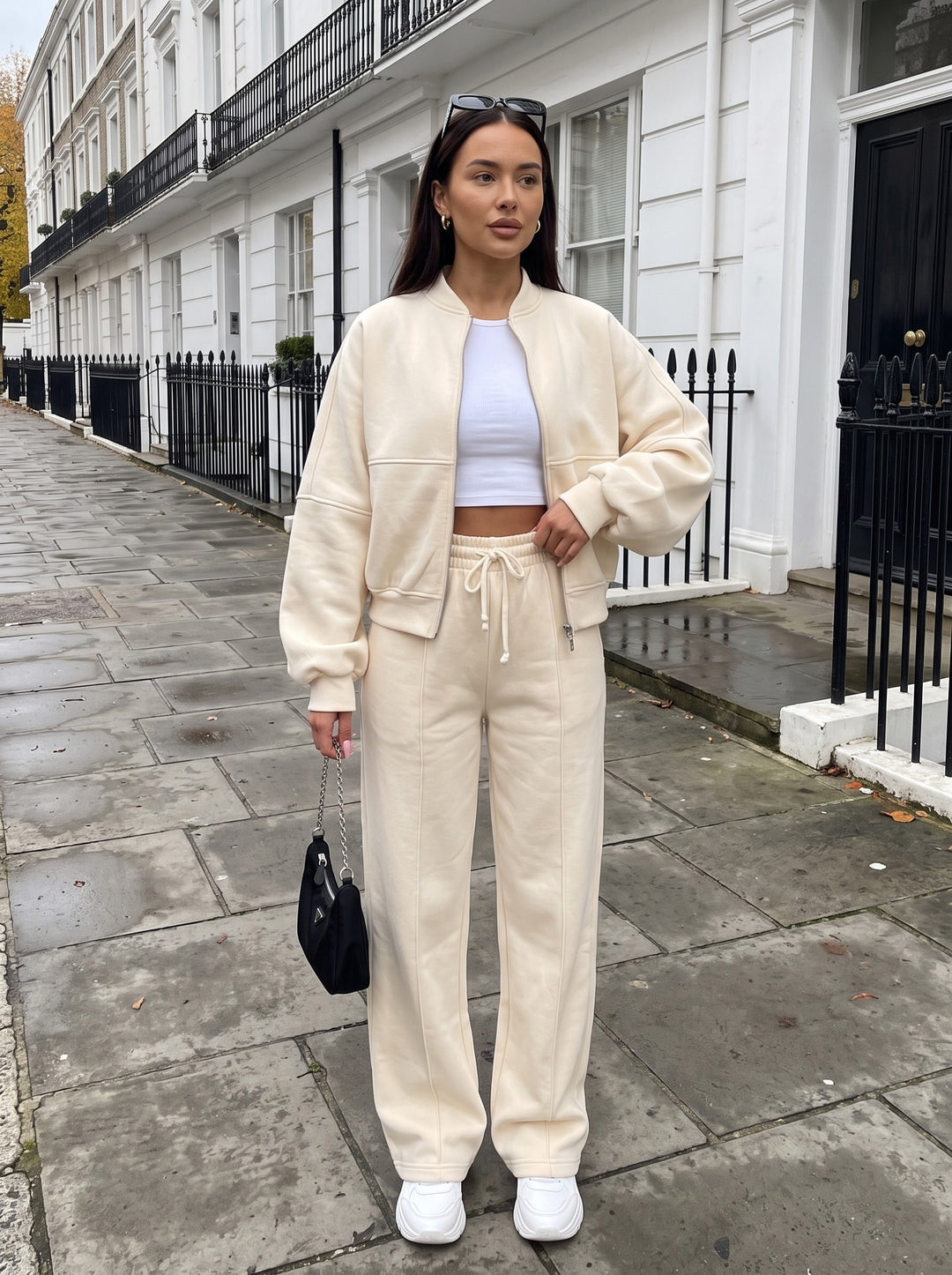 Ashlyn beige cropped zip-up jacket and wide-leg trousers set, worn on a London street
