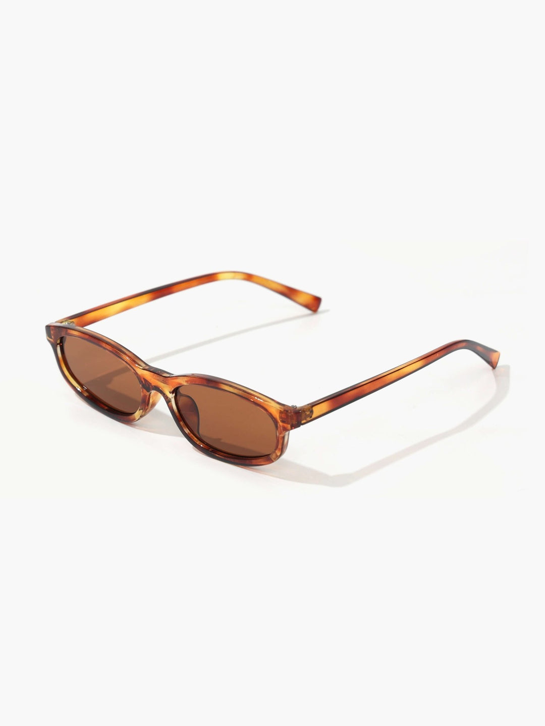Avi | Minimal Oval Sunglasses in first_variant_option1 | Elegant Women&