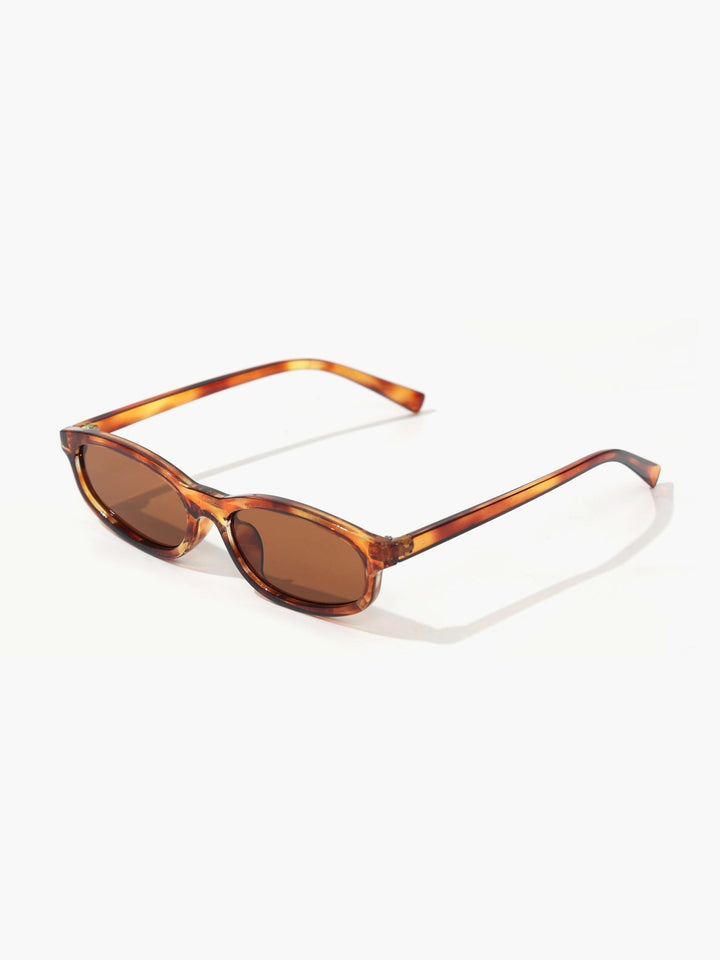 Avi | Minimal Oval Sunglasses in first_variant_option1 | Elegant Women&
