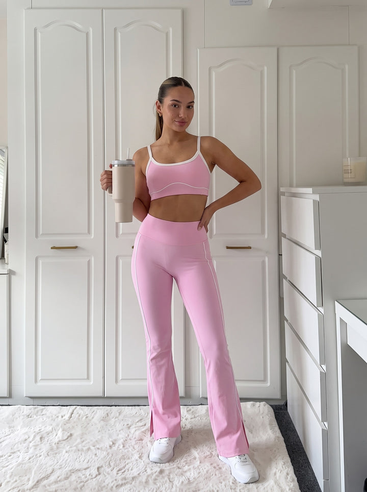 Barbara pink sports bra and flared leggings set with white contrast trim