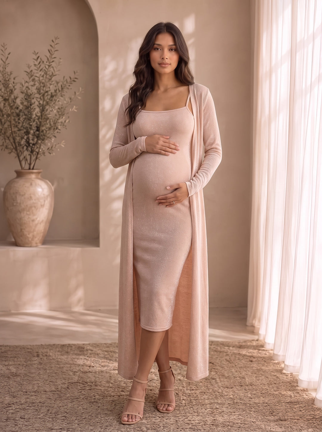 Camilla blush pink shimmer bodycon midi dress with spaghetti straps and matching open-front duster cardigan, front view