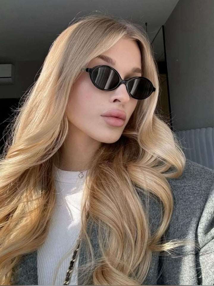 Clary | Chic Oval Sunglasses in first_variant_option1 | Elegant Women&