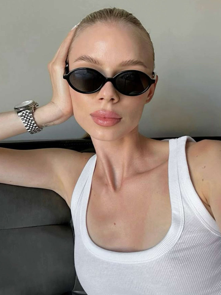 Clary | Chic Oval Sunglasses in first_variant_option1 | Elegant Women&