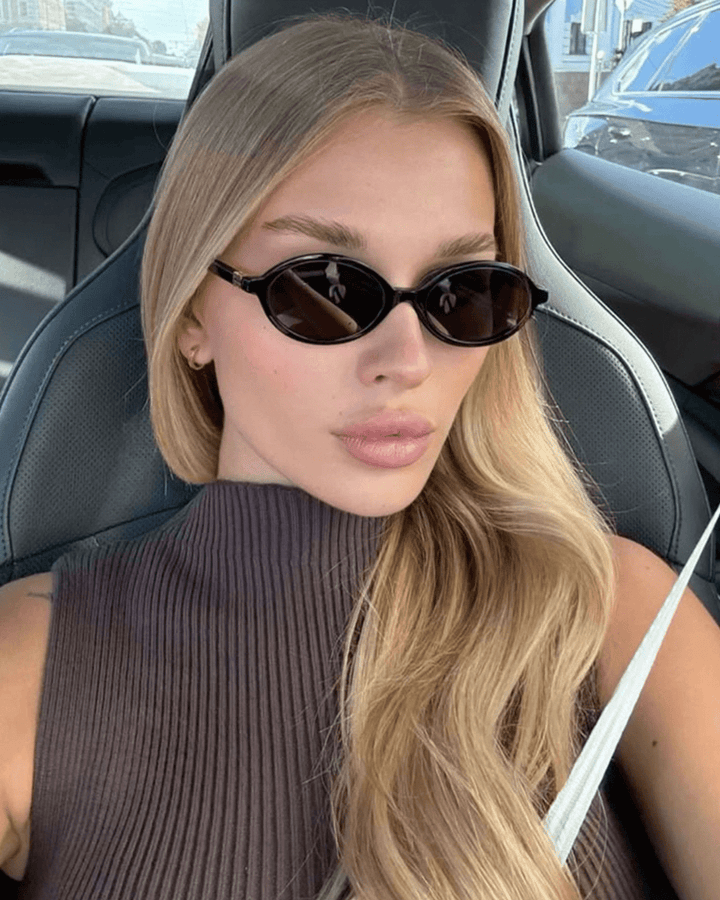 Clary | Chic Oval Sunglasses in first_variant_option1 | Elegant Women&