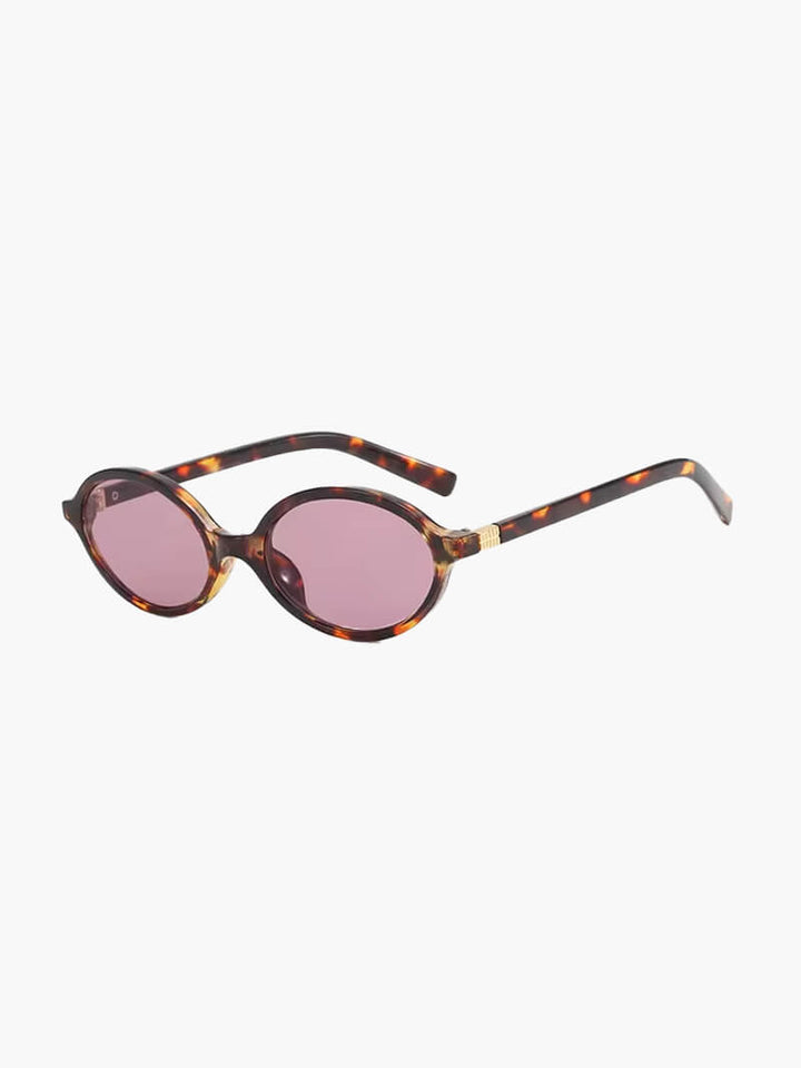 Clary | Chic Oval Sunglasses in first_variant_option1 | Elegant Women&