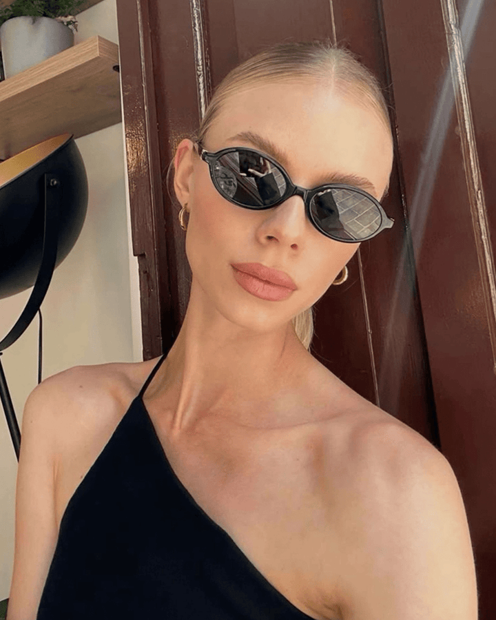 Clary | Chic Oval Sunglasses in first_variant_option1 | Elegant Women&
