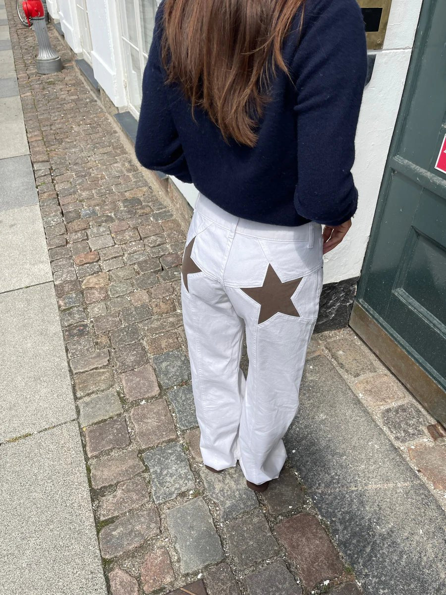 Maggie | Flare Star Jeans in first_variant_option1 | Elegant Women&