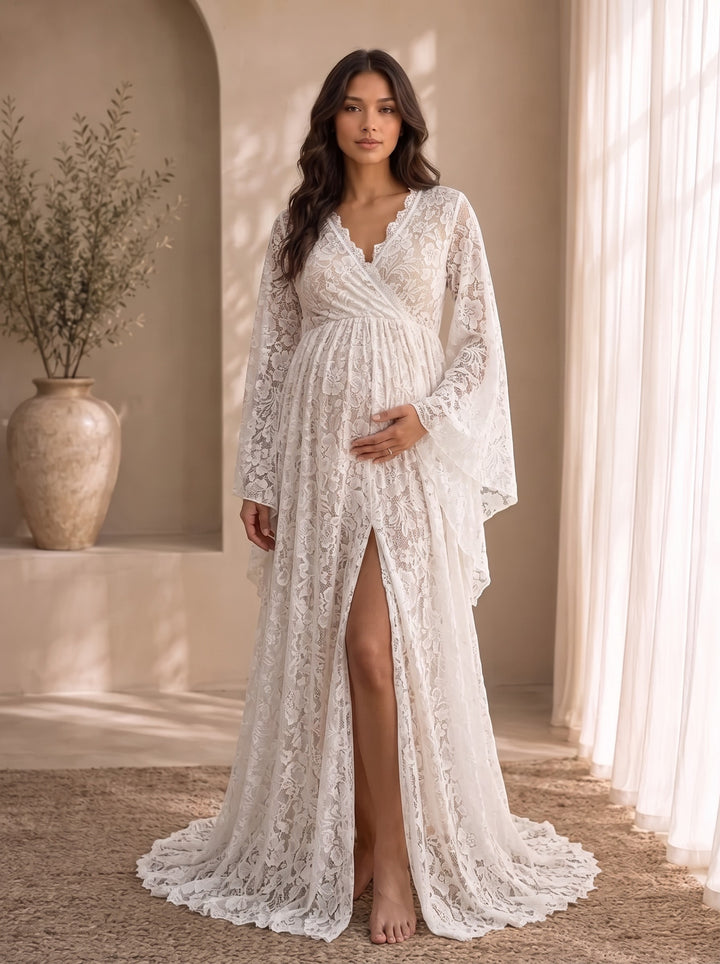 Mariposa white floral lace maxi maternity gown, front view, with wrap V-neckline, wide bell sleeves and front split