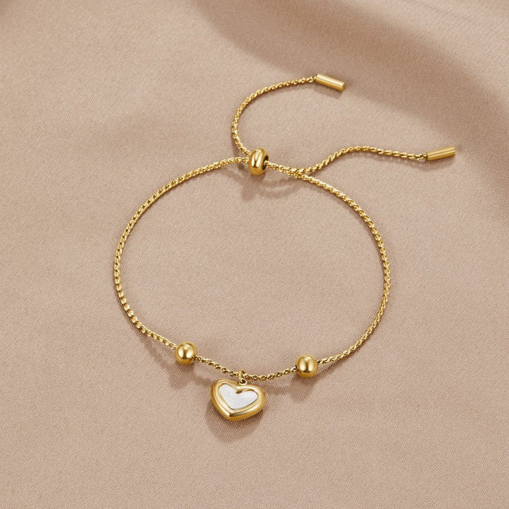Winola | Heart Charm Bracelet in first_variant_option1 | Elegant Women&